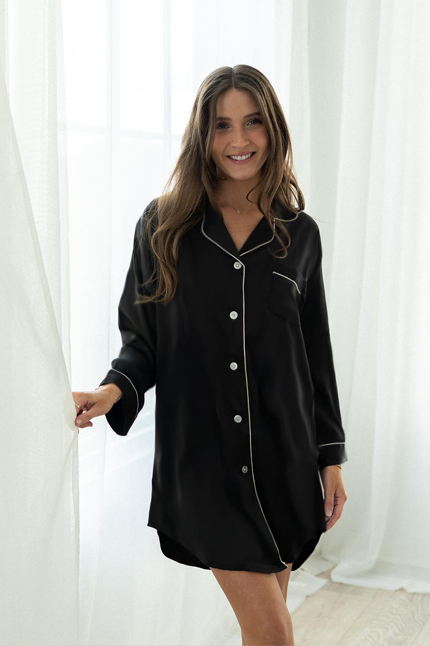Stylishly draped in the Black Satin Sleep Shirt, perfect for elegant evenings and cozy nights.