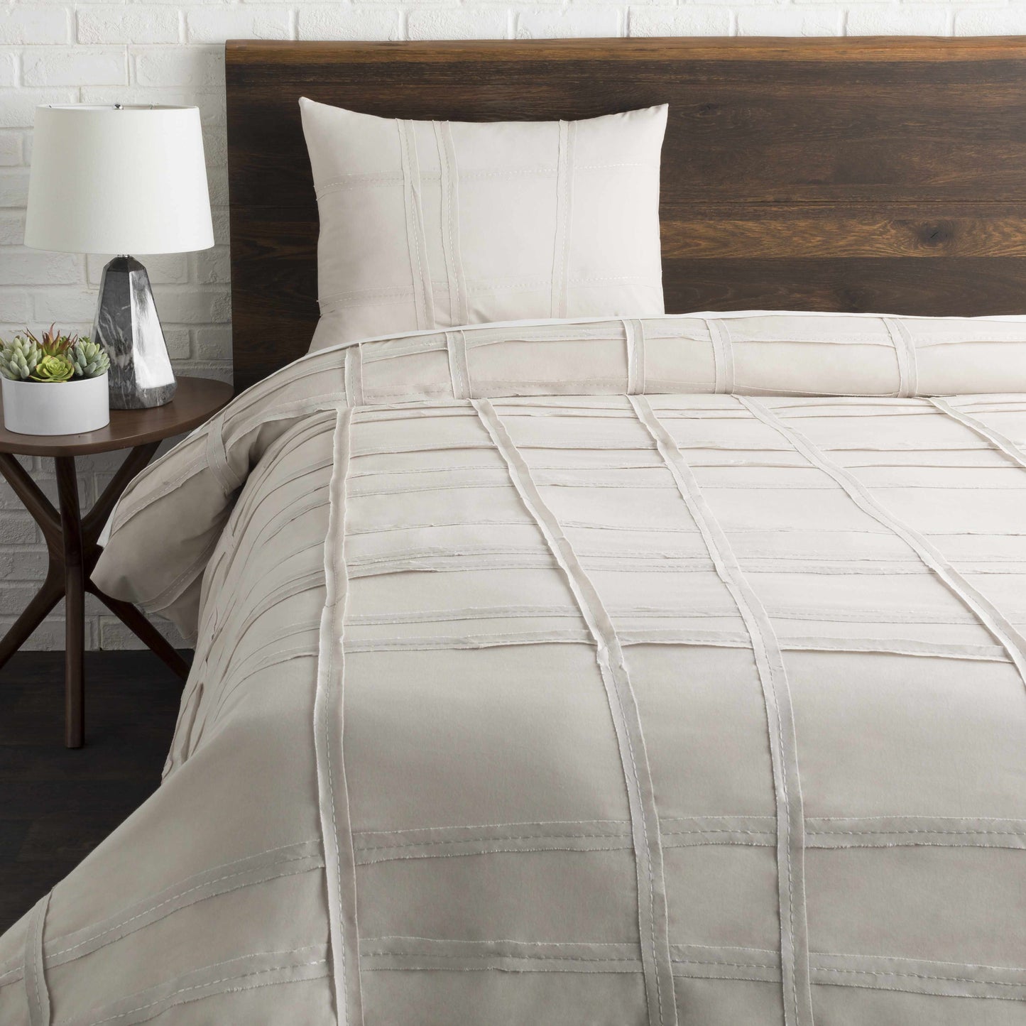 Transform your bedroom with the elegant Queens Contemporary Light Gray Bedding, crafted for style and comfort.